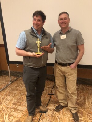 Tom Rizzo proudly received his Fel-Oscar for "Highest Total Sales Volume"